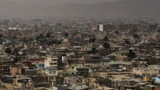 In this file photo, houses stand for miles in the cityscape of Kabul.