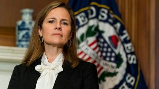 In this Oct. 1, 2020, file photo, Seventh U.S. Circuit Court Judge Amy Coney Barrett, President Donald Trump's nominee for the U.S. Supreme Court, meets with Sen. Jerry Moran (R-Kan.) as she prepares for her confirmation hearing, on Capitol Hill in Washington, D.C.