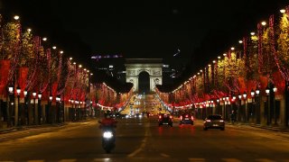 The Champs-Elysees Avenue and the Arc de Triomphe are seen after the Christmas illuminations were switched on in Paris, France, Nov. 22, 2020.