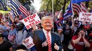 A cutout of U.S. President Donald Trump is pictured as supporters take part in a protest against the results of the 2020 U.S. presidential election in Atlanta, Georgia, November 21, 2020.