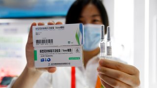 An exhibitor shows inactivated COVID-19 vaccine candidate from China National Biotec Group of Sinopharm Group during the 2020 China International Fair for Trade in Services at the Beijing Olympic Park on September 5, 2020 in Beijing, China.