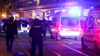 Austrian police say several people were injured and officers are out in force following gunfire in the capital Vienna, Nov. 2, 2020. Initial reports that a synagogue was the target of an attack couldn't immediately be confirmed. Austrian news agency APA quoted the country's Interior Ministry saying one attacker has been killed and another could be on the run.
