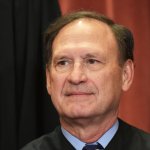 In this Nov. 30, 2018, file photo, Associate Justice Samuel Alito poses for the official group photo at the US Supreme Court in Washington, DC.