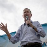 John Hickenlooper, former governor of Colorado and 2020 presidential candidate, speaks at the Des Moines Register Soapbox during the Iowa State Fair in Des Moines, Iowa, U.S., on Saturday, Aug. 10, 2019.