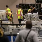 Election workers count ballots at the Philadelphia Convention Center on November 06, 2020 in Philadelphia, Pennsylvania.