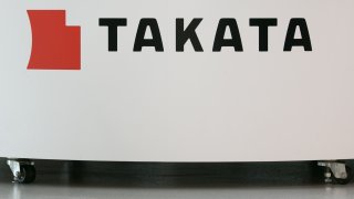 TOKYO, JAPAN - JUNE 26: A Takata Corp. logo is seen on display at a car showroom on June 26, 2017 in Tokyo, Japan. Japanese air bag maker Takata Corp. has filed for bankruptcy protection in Tokyo and the U.S. on June 26, 2017, overwhelmed by the outcome following its production of faulty air bag inflators that are linked to the death of more than 180 people globally. The company announced most of its assets will be bought by the Detroit rival, Key Safety Systems for about $1.6 billion (175 billion yen).