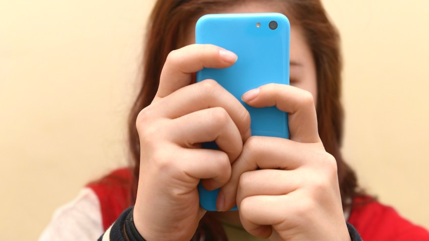 Close up of a teenager on her smartphone
