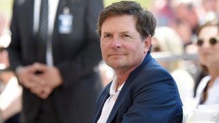 In this May 1, 2015, file photo, actor Michael J. Fox attends the ceremony honoring Julianna Margulies with a star on the Hollywood Walk of Fame in Hollywood, California.