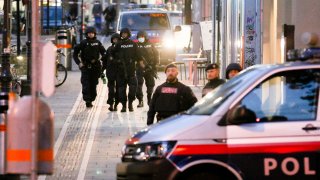 Following gunfire on people enjoying a last evening out before lockdown, police patrol at the scene in Vienna, early Tuesday, Nov. 3, 2020.