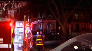 Chicago firefighters battle a blaze in the city's Edgewater neighborhood on November 7