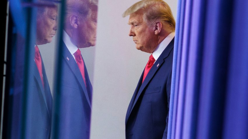 US President Donald Trump arrives to deliver remarks on the stock market during an unscheduled appearance in the Brady Briefing Room of the White House in Washington, DC on November 24, 2020.