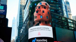 The Airbnb logo is displayed on the Nasdaq digital billboard in Times Square in New York on December 10, 2020.