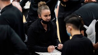San Antonio Spurs assistant coach Becky Hammon calls a play during a timeout in the second half of the team's NBA basketball game against the Los Angeles Lakers in San Antonio, Wednesday, Dec. 30, 2020.