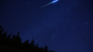One of green-glowing meteors over squaw pass