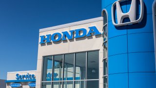 Honda Motor Co. Logo and Sign. Honda Manufactures Among the Most Reliable Cars in the World VI