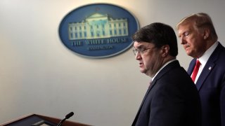 WASHINGTON, DC - MARCH 18: U.S. Secretary of Veterans Affairs Robert Wilkie speaks as President Donald Trump listens during a news briefing on the latest development of the coronavirus outbreak in the U.S. at the James Brady Press Briefing Room at the White House March 18, 2020 in Washington, DC. President Trump announced on Twitter that the U.S. and Canada will close their border to non-essential traffic to try and stop the spread of the COVID-19 pandemic.