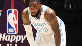 LeBron James #23 of the Los Angeles Lakers looks on during the game against the Dallas Mavericks on December 25, 2020 at STAPLES Center in Los Angeles, California. (Photo by Andrew D. Bernstein/NBAE via Getty Images)