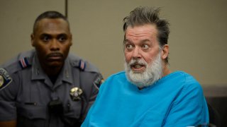 Robert Lewis Dear addresses Judge Gilbert Martinez during a court appearance December 09, 2015 in Colorado Springs, Colorado. El Paso County prosecutors filed formal charges against Lewis in the November 27 Planned Parenthood attack in which University of Colorado Colorado Springs police officer Garrett Swasey, Iraq war veteran Ke'Arre Stewart and Jennifer Markovsky, mother of two were killed.