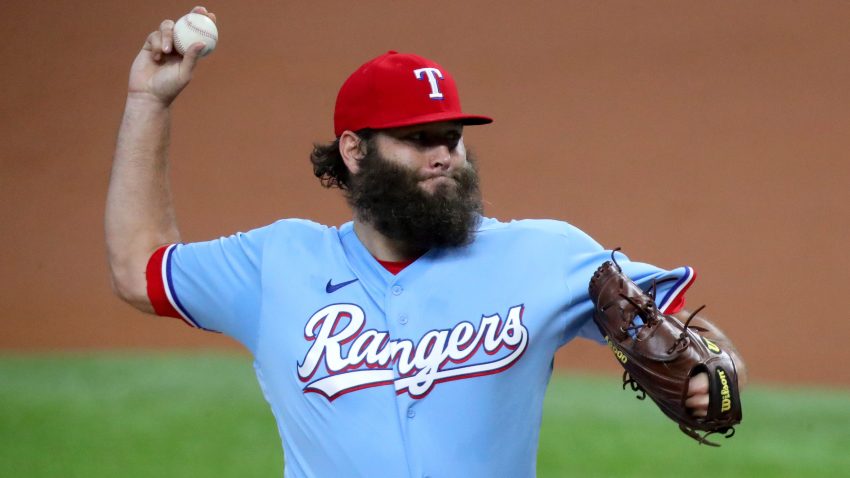 Wearing the team's powder blue alternate jersey, Texas Rangers pitcher Lance Lynn delivers a pitch in a game against the Oakland Athletics