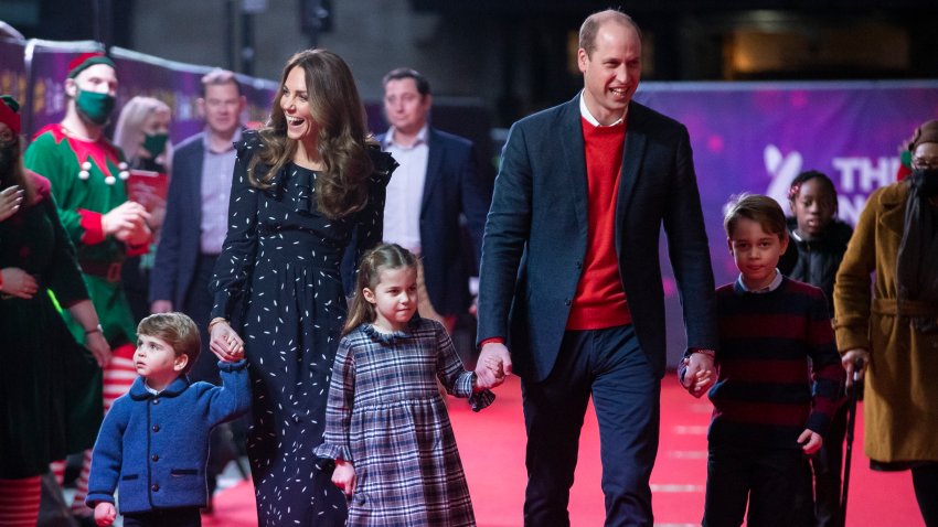 Prince William, Duke of Cambridge, and Catherine, Duchess of Cambridge, with their children, Prince Louis, Princess Charlotte and Prince George, attend a special pantomime performance at London's Palladium Theatre, hosted by The National Lottery, to thank key workers and their families for their efforts throughout the pandemic on December 11, 2020, in London, England.