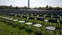 Empty chairs are on display to represent the 200,000 lives lost due to Covid-19 at the National Covid-19 Remembrance on the ellipse, behind the White House, Oct. 4, 2020, in Washington, D.C.