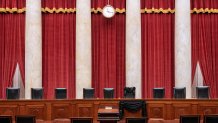 The bench and seat of Associate Justice Ruth Bader Ginsburg is draped in black cloth after her death, on Sept. 19, 2020 in Washington, D.C. Ginsburg was appointed to the Court by President Bill Clinton in 1993.