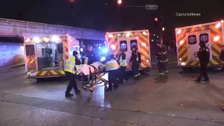 Multiple ambulances on the scene after a vehicle crashed into a Chicago ambulance on December 6th, with a patient being transported on a stretcher