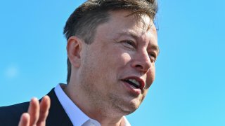 Elon Musk, CEO of Tesla, stands on the construction site of the Tesla Gigafactory. In Grünheide near Berlin, September 3, 2020.