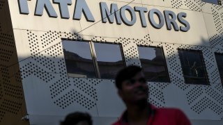 Signage for Tata Motors displayed at the company’s headquarters in Mumbai, India, on Jan. 27, 2018.