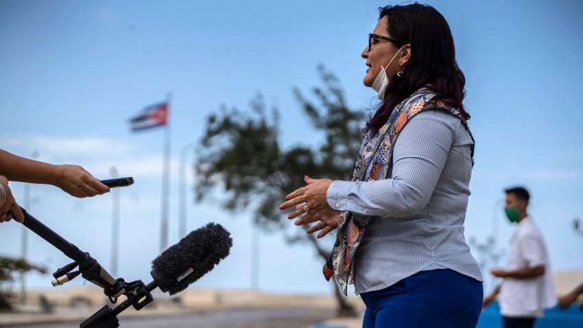 Deputy Director for the United States division of the Cuban Ministry of Foreign Affairs Johana Tablada speaks to reporters in Havana, Cuba, Thursday, Feb. 11, 2021. The Cuban government expects that the administration of President Biden reverts the measure taken by the previous administration with regards to the relation between the two nations.