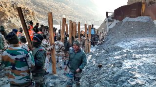 Indo Tibetan Border Police (ITBP) personnel undertake rescue work at one of the hydro power project at Reni village in ​​Chamoli district, in Indian state of Uttrakhund, Monday, Feb.8, 2021. Rescue efforts continued on Monday to save 37 people after part of a glacier broke off, releasing a torrent of water and debris that slammed into two hydroelectric plants on Sunday.