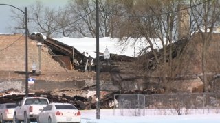 Chicago fire personnel are on the scene of a building collapse, as the roof of a building caved in because of heavy snow