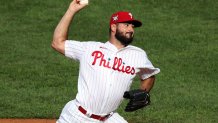 PHILADELPHIA, PA - AUGUST 29: Brandon Workman #42 of the Philadelphia Phillies throws a pitch during a game against the Atlanta Braves at Citizens Bank Park on August 29, 2020 in Philadelphia, Pennsylvania. All players are wearing #42 in honor of Jackie Robinson, traditionally held on April 15, was rescheduled due to the COVID-19 pandemic. The Phillies won 4-1. (Photo by Hunter Martin/Getty Images)