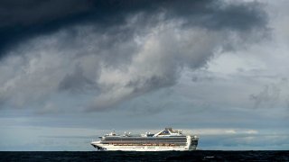 FILE - The Grand Princess cruise ship, carrying multiple people who tested positive for COVID-19, maintains a holding pattern about 30 miles off the coast of San Francisco, March 8, 2020.
