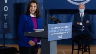 Michigan Governor Gretchen Whitmer introduces Democratic Presidential Candidate Joe Biden to speak at Beech Woods Recreation Center in Southfield, Michigan, on October 16, 2020. - Joe Biden on October 16, 2020 described President Donald Trump's reluctance to denounce white supremacists as "stunning" in a hard-hitting speech in battleground Michigan with 18 days to go until the election.