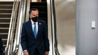 WASHINGTON, DC - FEBRUARY 23: Sen. Mitt Romney (R-UT) departs following a vote in the subway of the U.S. Capitol on February 23, 2021 in Washington, DC. The Senate held confirmation hearings today for multiple Biden administration nominees as well as a hearing regarding the January 6 attack on the U.S. Capitol.