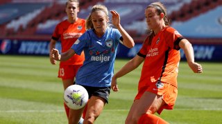 Jul 26, 2020; Sandy, Utah, USA; Chicago Red Stars forward Rachel Hill (5) and Houston Dash defender Katie Naughton (25) battle in the first half at Rio Tinto Stadium. Mandatory Credit: Jeffrey Swinger-USA TODAY Sports