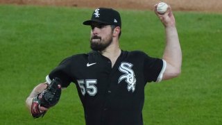 CHICAGO, ILLINOIS – APRIL 14: Carlos Rodon #55 of the Chicago White Sox delivers a pitch during the first inning of a game against the Cleveland Indians at Guaranteed Rate Field on April 14, 2021 in Chicago, Illinois. (Photo by Nuccio DiNuzzo/Getty Images)