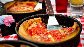 Deep dish pizza sits on a table at Gino’s East restaurant in Chicago, Illinois, U.S., on Wednesday, April 18, 2012. U.S. restaurant-industry sales for a typical day in 2012 are estimated to be $1.7 billion, according to the National Restaurant Association. Photographer: Daniel Acker/Bloomberg via Getty Images