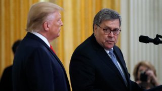 FILE - In this Monday, Sept. 9, 2019, file photo, Attorney General William Barr speaks as President Donald Trump listens during a ceremony in the East Room of the White House, in Washington. Trump recently asked the Australian prime minister and other foreign leaders to help Barr with an investigation into the origins of the Russia probe that shadowed his administration for more than two years, the Justice Department said Monday. Sept. 30.