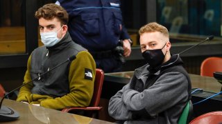 In this April 29, 2021, file photo, Gabriel Natale-Hjorth, left, and his co-defendant Finnegan Lee Elder, both from the United States, during a break of a hearing of their trial in Rome.