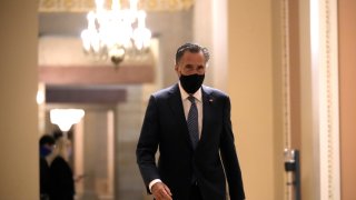 Sen. Mitt Romney (R-UT) walks through the U.S. Capitol after President Biden's address to congress April 28, 2021 in Washington, DC.