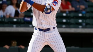 Brennen Davis #94 of the Chicago Cubs in action against the Seattle Mariners in the sixth inning on March 03, 2021 at Sloan Park in Mesa, Arizona