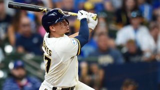 Willy Adames #27 of the Milwaukee Brewers hits a grand slam against the Chicago Cubs in the fourth inning at American Family Field on June 30, 2021