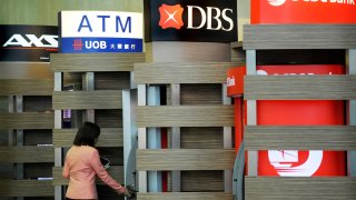 Automated teller machines of the three Singapore-listed banks: OCBC, DBS and UOB.