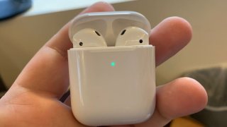 Second-generation Apple AirPods with wireless charging indicator