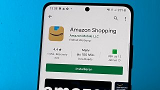 The Amazon shopping app in the Google Play Store on an Android smartphone.