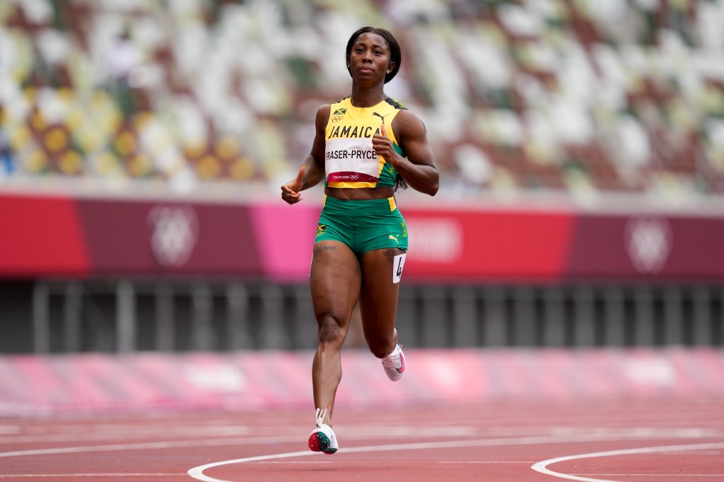 Shelly-Ann Fraser-Pryce of Jamaica wins a heat in the women's 100-meter run at the 2020 Summer Olympics, Friday, July 30, 2021, in Tokyo.