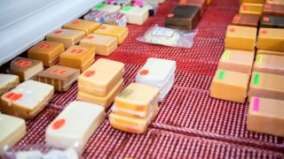 Locally produced cheese is displayed for sale at a store in Plain, Wisconsin, U.S., on Saturday, March 16, 2019. The worst agricultural downturn since the 1980s is taking its toll on the emotional well-being of American farmers. Glutted grain markets have sparked a years-long price slump made worse by a trade war with top buyer China. Photographer: Lauren Justice/Bloomberg via Getty Images