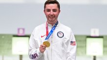 Gold medallist USA's William Shaner poses on the podium during the medal ceremony for the men's 10m air rifle final during the Tokyo 2020 Olympic Games at the Asaka Shooting Range in the Nerima district of Tokyo on July 25, 2021.